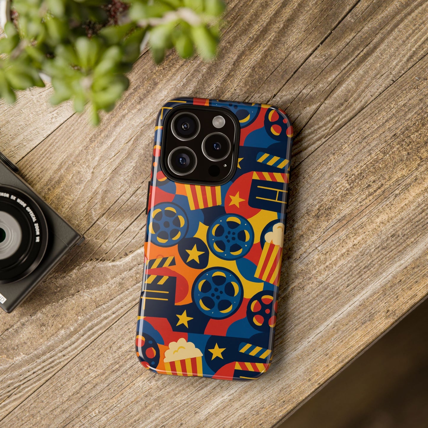 vibrant movie-themed protective phone case with colourful film reel and popcorn design for stylish protection compatible with iphone 13, 14, 15 & 16 – all models including pro, pro max & plus