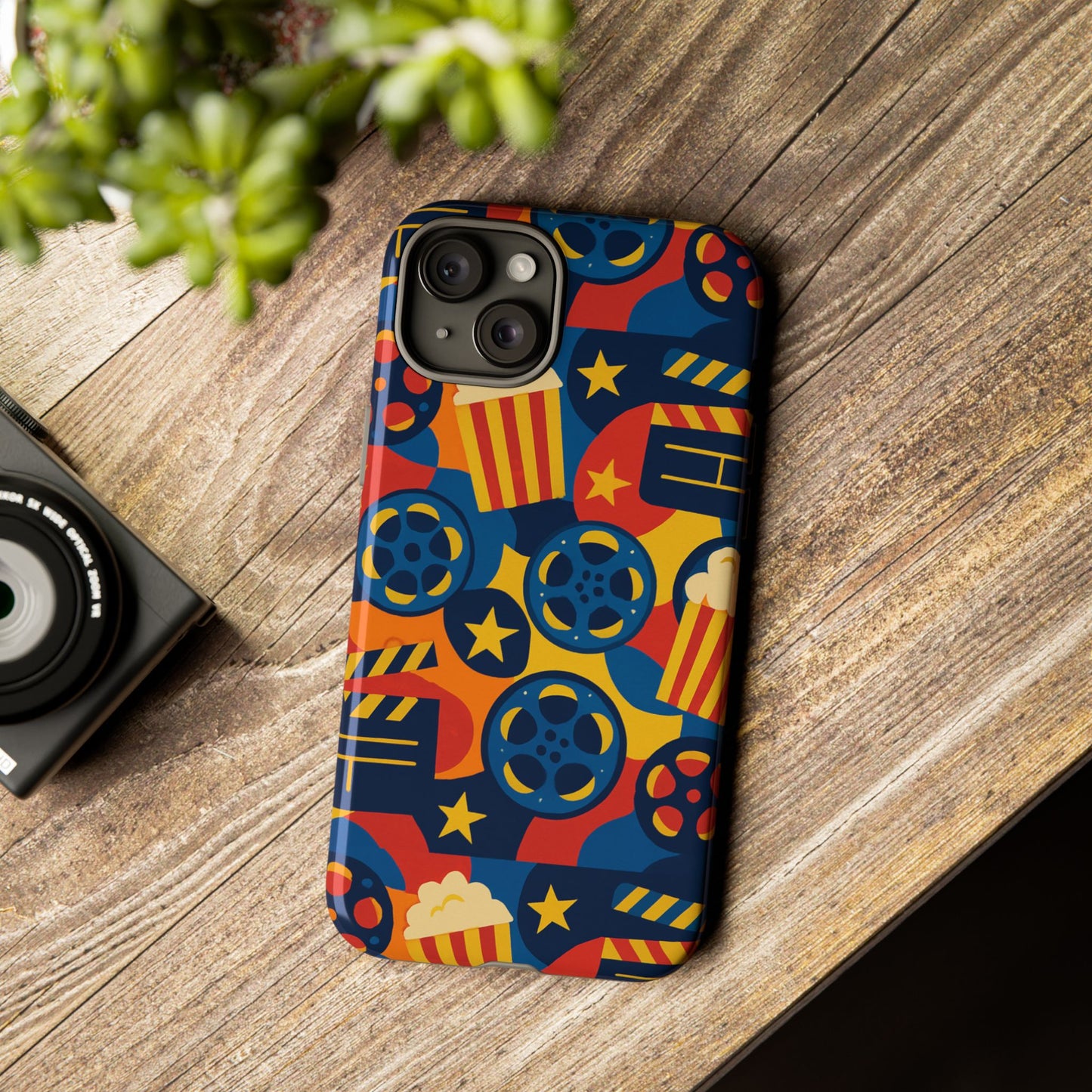 vibrant movie-themed protective phone case with colourful film reel and popcorn design for stylish protection compatible with iphone 13, 14, 15 & 16 – all models including pro, pro max & plus