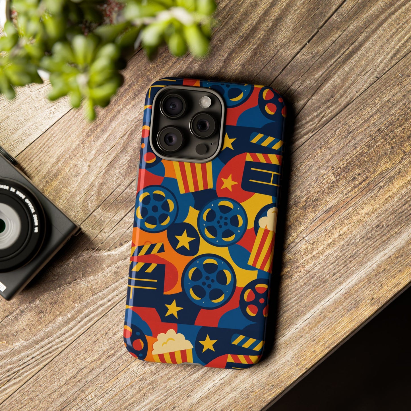 vibrant movie-themed protective phone case with colourful film reel and popcorn design for stylish protection compatible with iphone 13, 14, 15 & 16 – all models including pro, pro max & plus