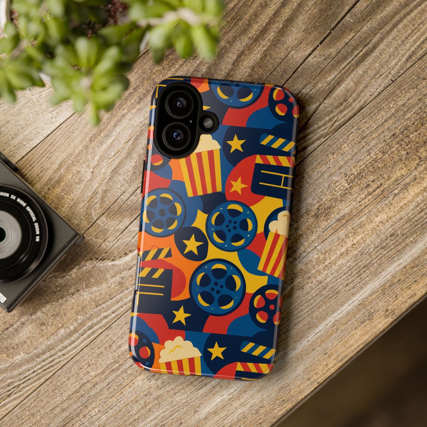 vibrant movie-themed protective phone case with colourful film reel and popcorn design for stylish protection compatible with iphone 13, 14, 15 & 16 – all models including pro, pro max & plus