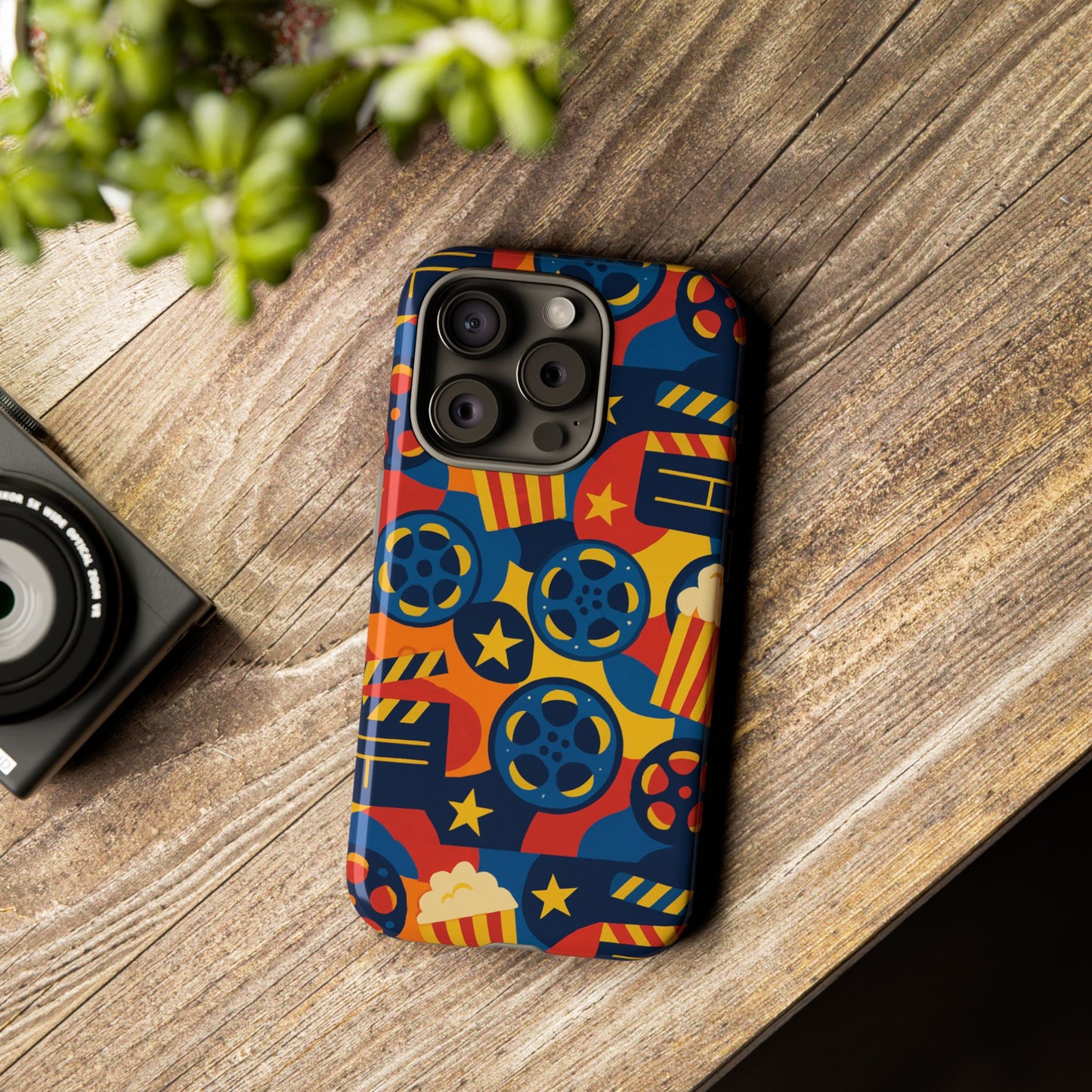 vibrant movie-themed protective phone case with colourful film reel and popcorn design for stylish protection compatible with iphone 13, 14, 15 & 16 – all models including pro, pro max & plus